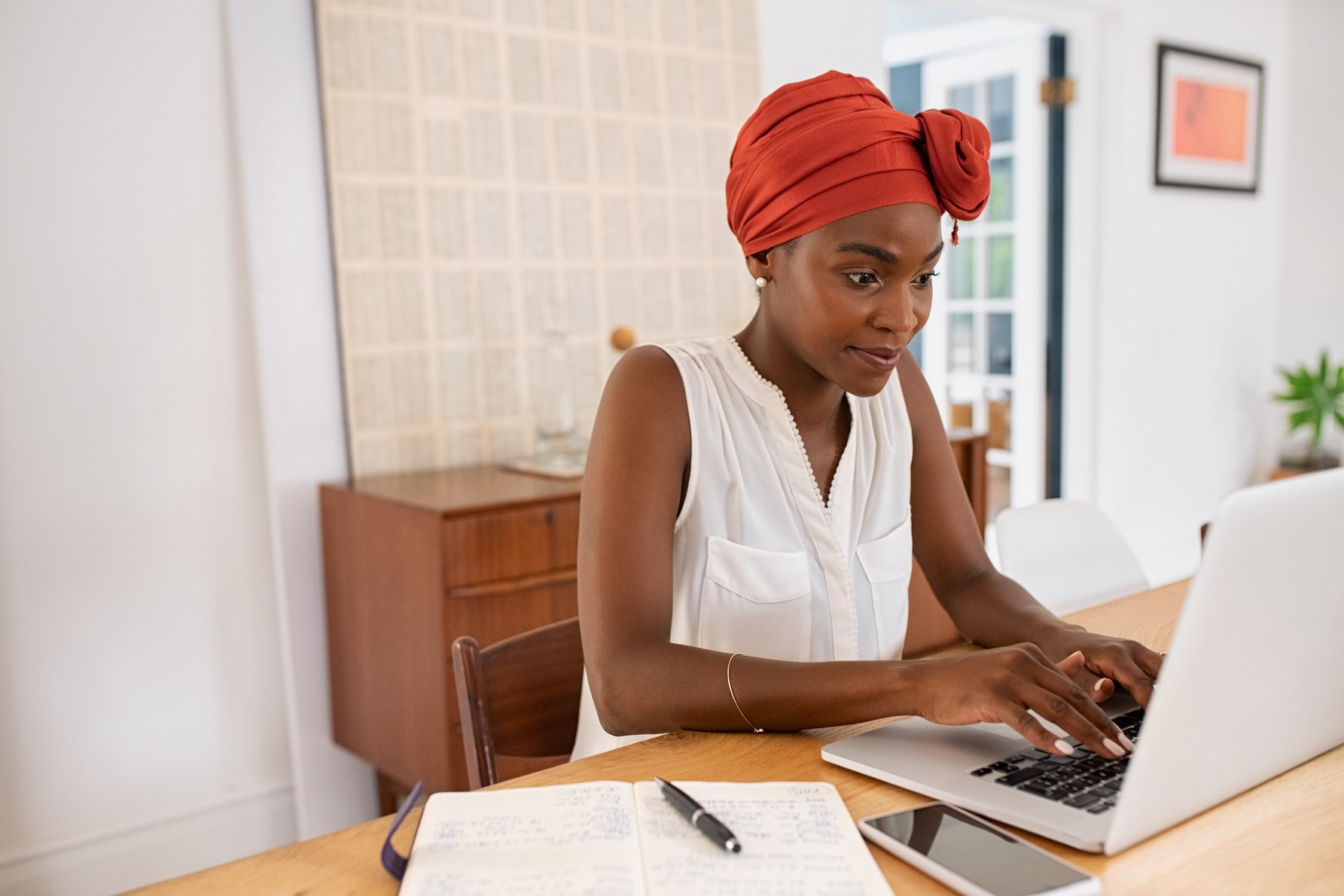 Woman Working on Laptop from Home